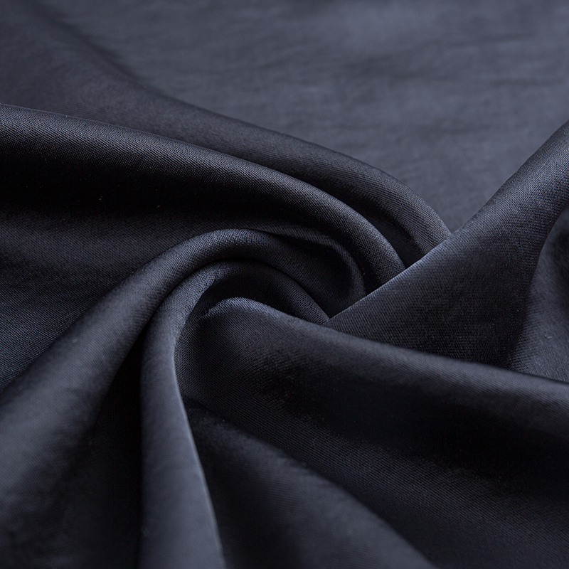 Tissu en satin extensible à trame filamentaire