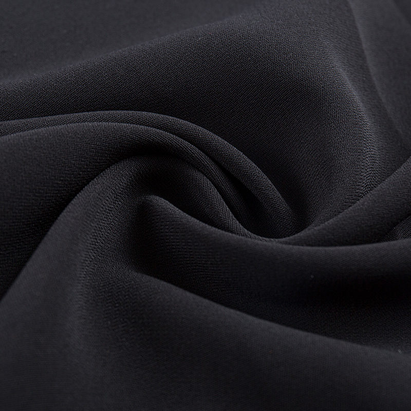 Tissu extensible à double couche en trame de filament composite